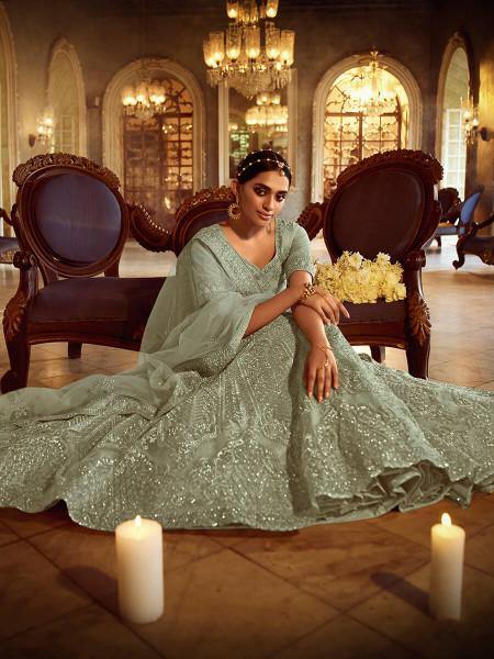 Green Soft Net Heavy Embroidered Lehenga