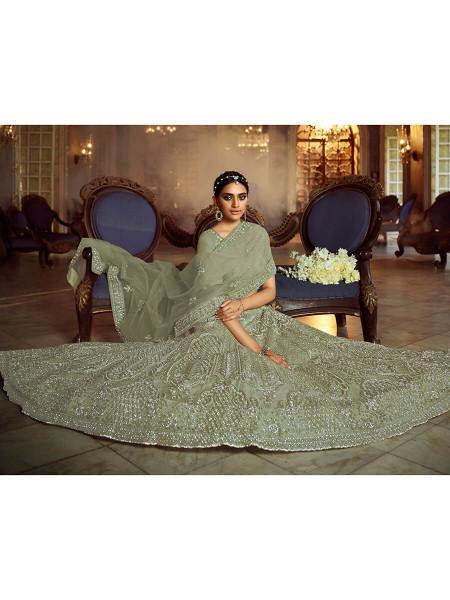 Green Soft Net Heavy Embroidered Lehenga