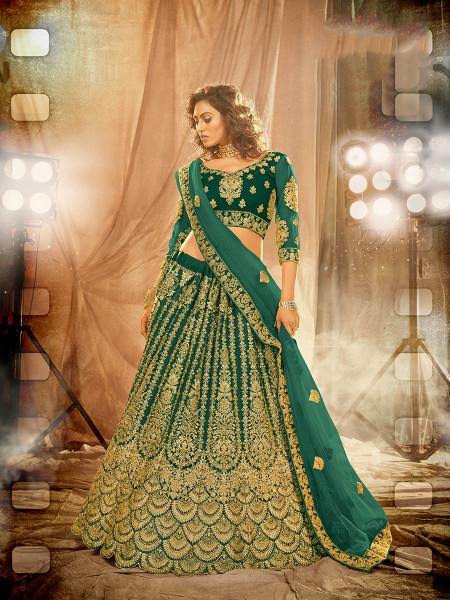 Rama Green Heavy Embroidered Net Lehenga