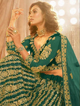 Rama Green Heavy Embroidered Net Lehenga