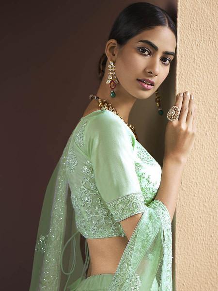 Green Heavy Embroidered Soft Net bridal Lehenga