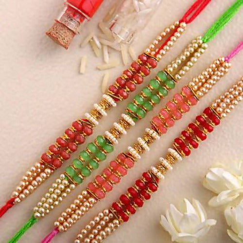 Set of 4 Pretty Pearls Rakhi and Kaju Katli Box