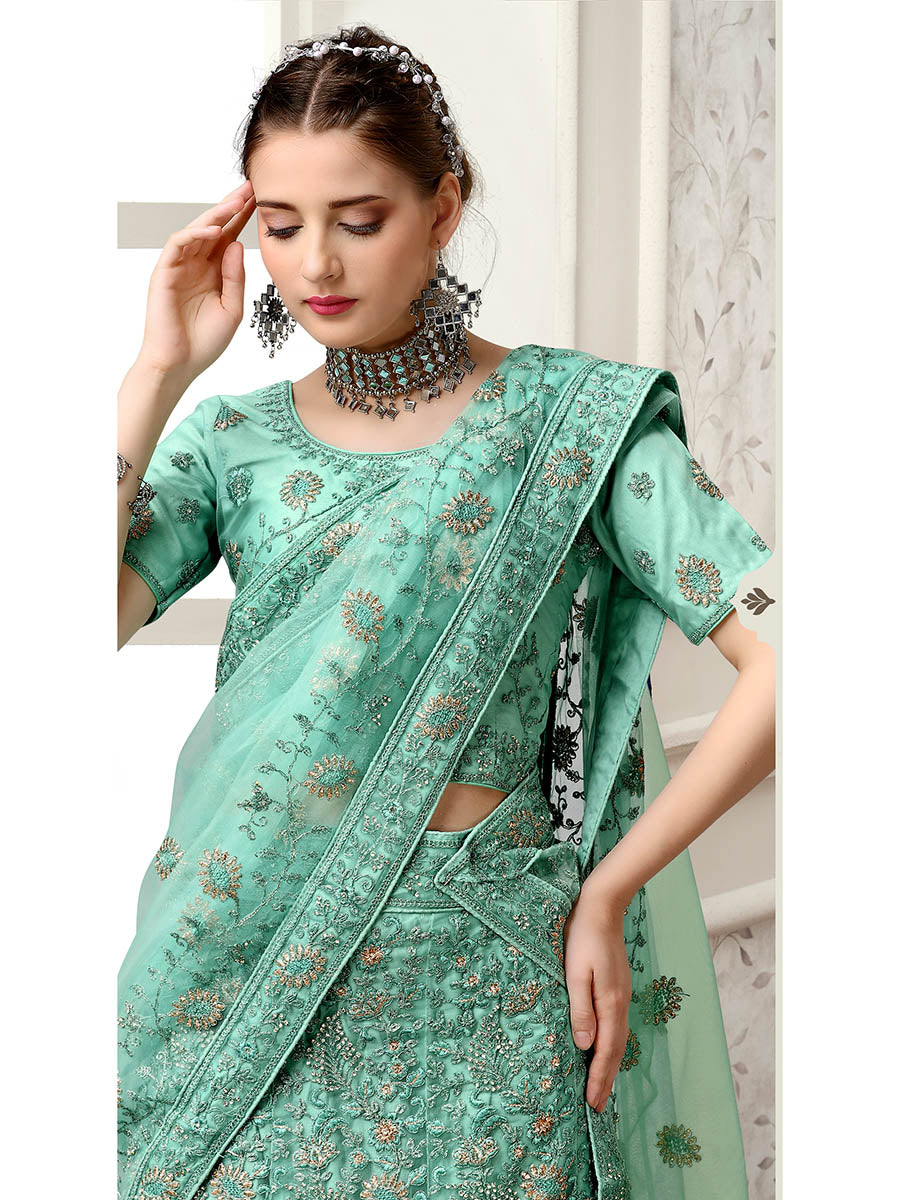 Sea Green Net Heavy Embroidered Lehenga Choli